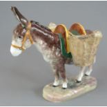 An early twentieth century Royal Crown Derby bone china model of a donkey, Festino Lente, modelled