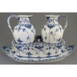 A late nineteenth century blue and white hand-painted Continental porcelain cruet set, c. 1870.