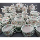 An extensive Minton Haddon Hall pattern tea service, comprising of: two teapots and covers, two