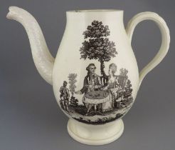 An eighteenth century Wedgwood creamware coffeepot, c. 1760-70. It is decorated with the tea