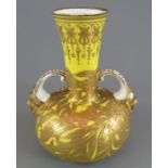 A late nineteenth century Derby porcelain two-handle vase, c. 1884. It has fine raised gilding on