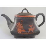 A late eighteen, early nineteenth century Wedgwood black basalt teapot and cover, c. 1790-1810. It