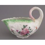 A mid-eighteenth century Derby porcelain moulded and hand-painted with floral sprays sauce boat,