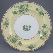 An early nineteenth century green and white transfer-printed Spode armorial plate, c. 1820. It is