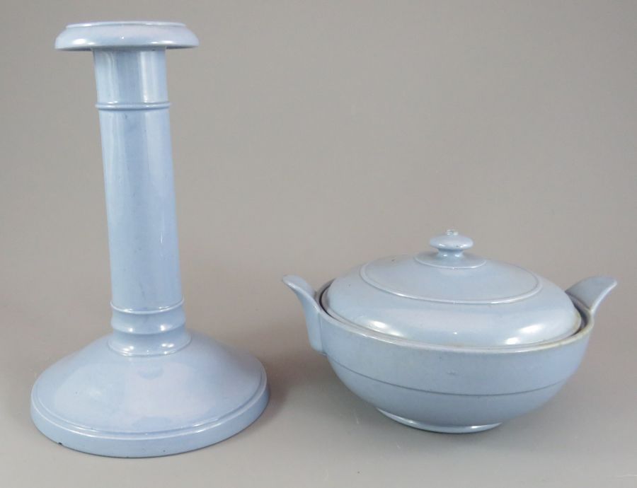 An early nineteenth century Spode blue ground candle stick and covered butter tub, c. 1820. Both are