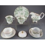 A group of early nineteenth century green and white transfer-printed Spode Felspar porcelain trio