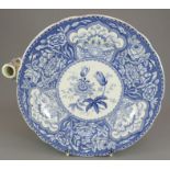 An early nineteenth century blue and white transfer-printed Spode Floral series hot water plate,