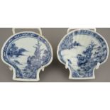A pair of mid-eighteenth century hand-painted blue and white Chinese porcelain shell-shaped pickle