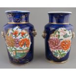 A pair of early nineteenth century Masons Iron Stone vases, c. 1815. They are marked to the