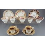 A group of early nineteenth century hand-painted mainly Spode porcelain cups and saucers, c. 1820-