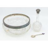 A collection of silver to include: A Victorian glass elongated scent bottle with silver collar and