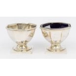 A pair of George V silver octagonal shaped salts, on square plinth bases, hallmarked by S W