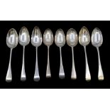 A group of eight Georgian plain silver Old English Pattern table spoons, all hallmarked London,