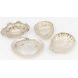 Four various 19th & 20th Century silver bon bon dishes; two pieced shaped Victorian dishes; a