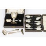 An Elizabeth II silver plain egg cup and spoon, hallmarked by Barker Brothers, Birmingham, 1950,