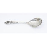 An early 20th Century Danish silver ornate dessert spoon, planished bowl, ornate openwork