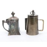 An early 20th Century pewter mustard pot and cover, domed cover, blue glass liner, stamped to the