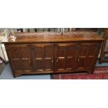 Squirrelman: Wilf Hutchinson. English oak panelled sideboard with four doors, cast metal hinges.