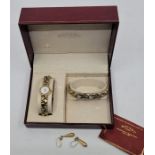 A Rotary ladies' gilt and white metal quartz bracelet watch, having signed circular baton dial,