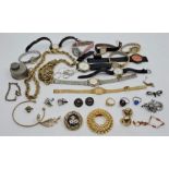 A collection of costume jewellery, including assorted ladies' wrist watches. (qty)