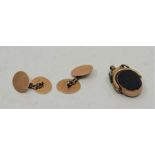 A pair of 9ct. rose gold oval cufflinks, chain fitting, (4.6g), in jewellers case, together with a