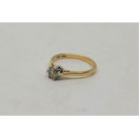 An 18ct. yellow gold diamond solitaire ring, claw set round brilliant cut diamond (estimated diamond