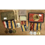 Two sets of medals for Farther and Son and Christmas tins. A South Africa Christmas tin 1900 tin,