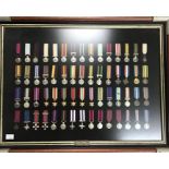 Framed Collection of British miniature medals, see pictures for details of medals. Frame size 65cm x