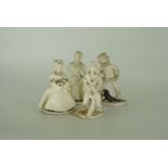 A set of four porcelain figures  By E. Mandle (signed) Height 6"