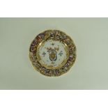 A Naples porcelain plaque with moulded border painted with a coat of arms. Early 20th Century 9" (