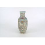 A Chinese porcelain Roleau form vase painted in colored enamel with mille flouri pattern Base