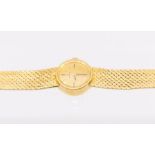 Omega- a ladies 18ct gold  Omega wristwatch, circa 1960's, round gold tone dial, with applied