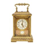 A French ormolu cased carriage clock, the enamel dial and subsidiary dial below with Arabic