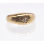 A diamond 22ct gold ring set with a round old cut diamond star set, approx 0.05ct, size R, total