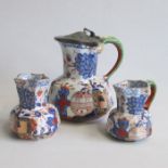 Three Davenport Stone China Hydra Jugs, one with a pewter lid Date circa 1825   Marked Size   15cm.