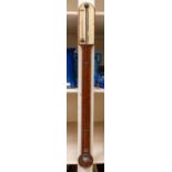 J Davis of Derby stick barometer in oak case with round top. 38" long covered tube and wooded