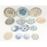 A group of fourteen provincial Chinese and South East Asian blue and white dishes of various