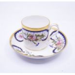 A Derby Stevenson & Hancock 1863-1866 large coffee can and saucer, both decorated with shaped floral