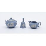 A collection of three Wedgwood miniature Jaspar ware items including: sucrier and cover; cream jug