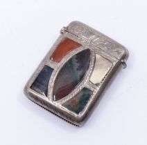 An Edwardian silver and hardstone vesta case, the cover inset with shaped hardstones within engraved