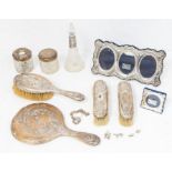 A group of mainly early 20th Century table silver to include: four piece dressing table set (
