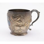 A Victorian silver gilt barrel shaped Christening mug, the body chased with strawberries and