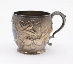 A Victorian silver gilt barrel shaped Christening mug, the body chased with strawberries and