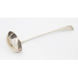 A George III Scottish Provincial Old English Pattern soup ladle, the handle engraved with initial,