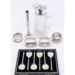 A collection of 20th Century silver to include: American silver mounted glass pouring jug, the plain