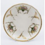 A rare Swansea glacee porcelain saucer dish, decorated in Empire style with flower groups sitting on
