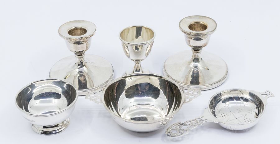 A collection of 20th Century table silver to include: pair of Modern small candlesticks, filled,