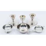 A collection of 20th Century table silver to include: pair of Modern small candlesticks, filled,