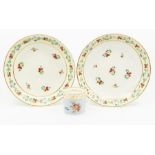 A pair of red Derby dishes, circa 1815, decorated with polychrome sprigs together with a Bloor Derby