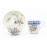 Christians Liverpool tea bowl and saucer, c.1770, decorated with typical flower sprays within a